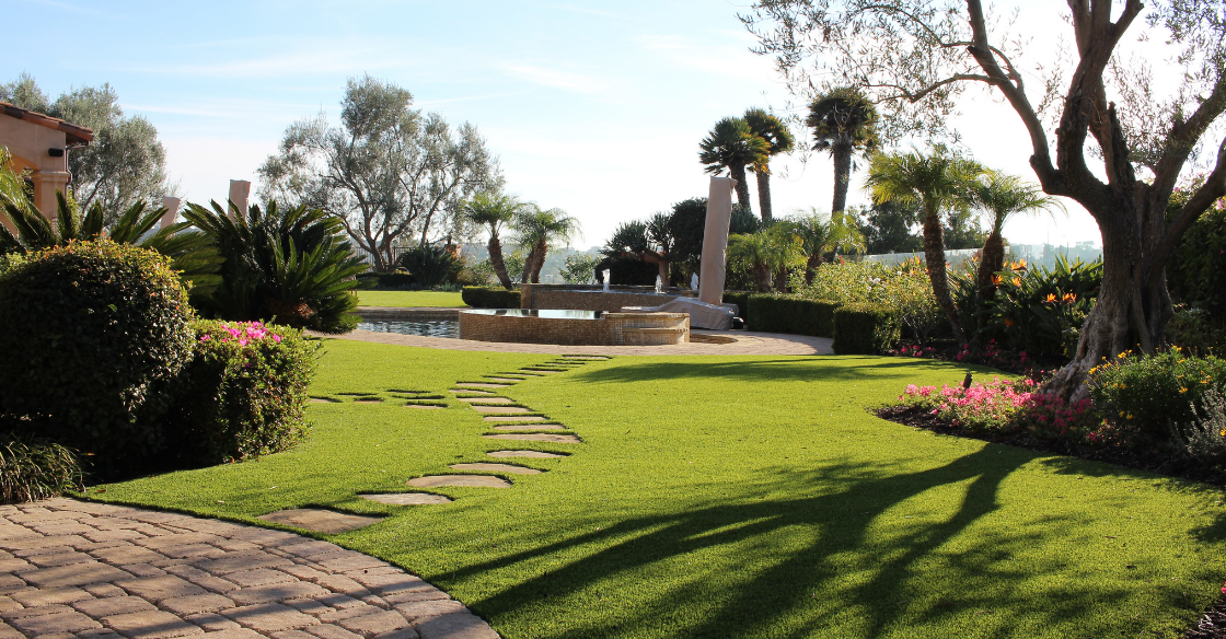 spacious backyard with artificial turf