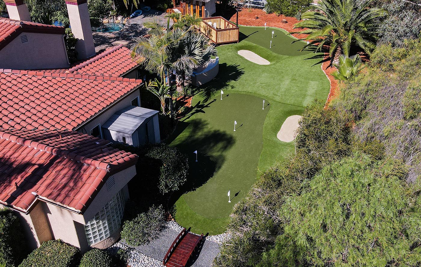 Playground with synthetic grass. Commercial artificial grass installation. Artificial Grass Installation